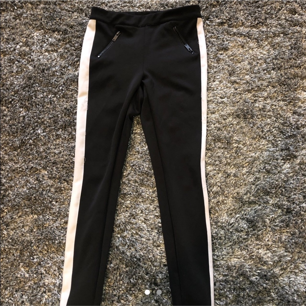 Black and white pants with zippers